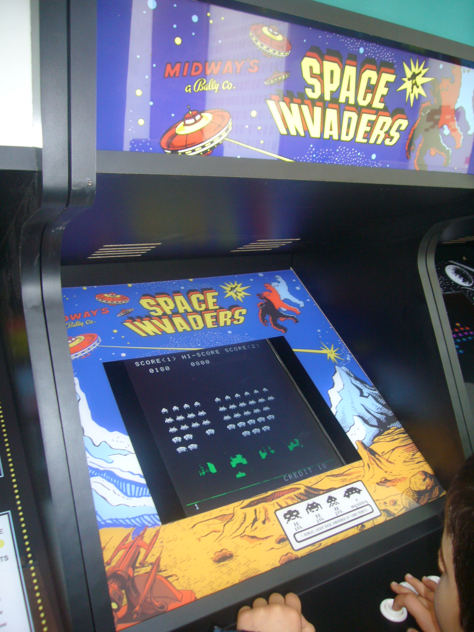 Imagem de referência relacionada a Space Invaders, item descrito como videojogo de 1978