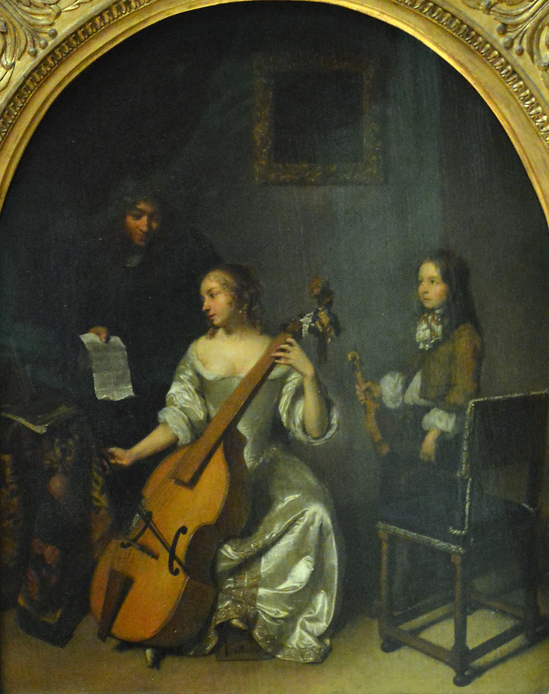 Imagem de referência de A lição de viola baixo, descrito nos dados abertos como pintura de Caspar Netscher
