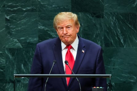 Donald Trump at a podium addressing the audience at the UN general assembly in New York City.