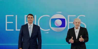 Fl&aacute;vio Bolsonaro (PL) e Lula (PT) no &uacute;ltimo debate das elei&ccedil;&otilde;es 2026 Foto: Reprodu&ccedil;&atilde;o/TV Globo / Estad&atilde;o